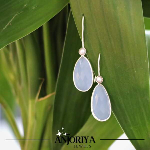 Handcrafted in 925 Sterling Silver Studded With pearl & Chalcedony Gem Stone Teardrop Earring With Green Background 