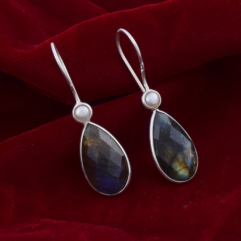 Handcrafted in 925 Sterling Silver Studded With Labradorite & Pearl Gem Stone With  Red Background 
