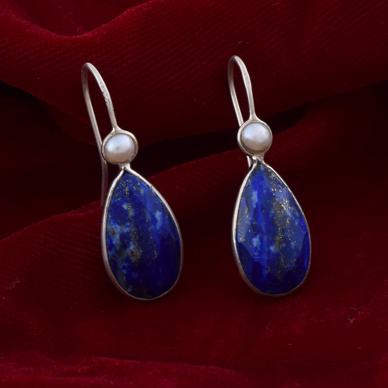 Handcrafted 925 Sterling Silver Oval shape Lapis Lazuli Gem Stone Studded With Pearl With Red Background