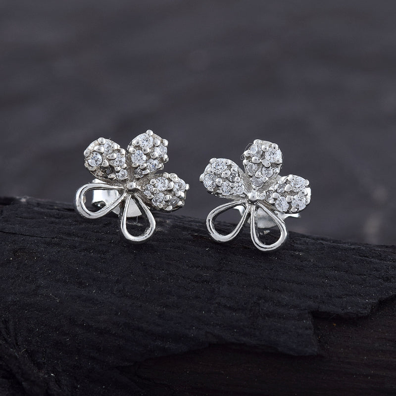 Handcrafted In 925 Sterling Silver Stud Earring Studded with Cubic Zirconia Flower Shape Black Background 