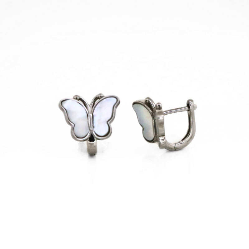 A pair of butterfly-shaped stud earrings with a shiny silver frame and iridescent white wings, displayed on a white background.