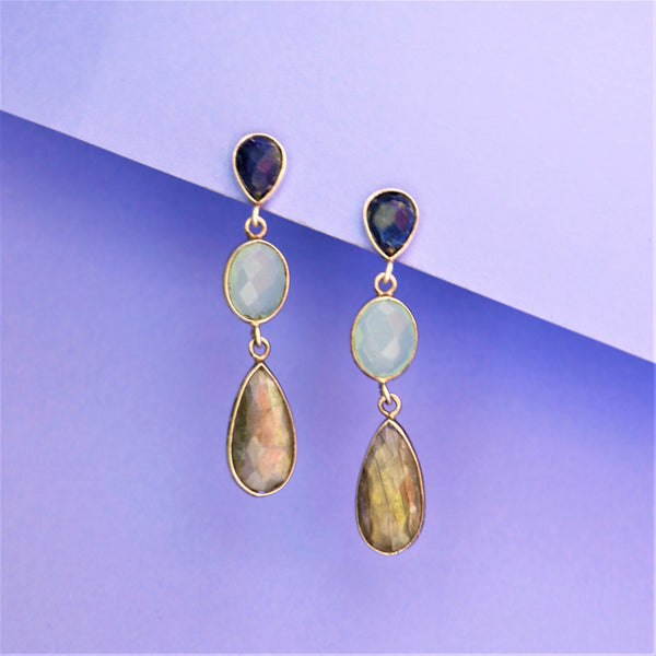 Handcrafted In 925 Sterling Silver Labradorite And Lapis Lazuli With Oval Cut Calcedony Ae The Three Type Of Gems Stones Are Bidded In One Earring For Casually Use Purpose Earring With Purple  Background 